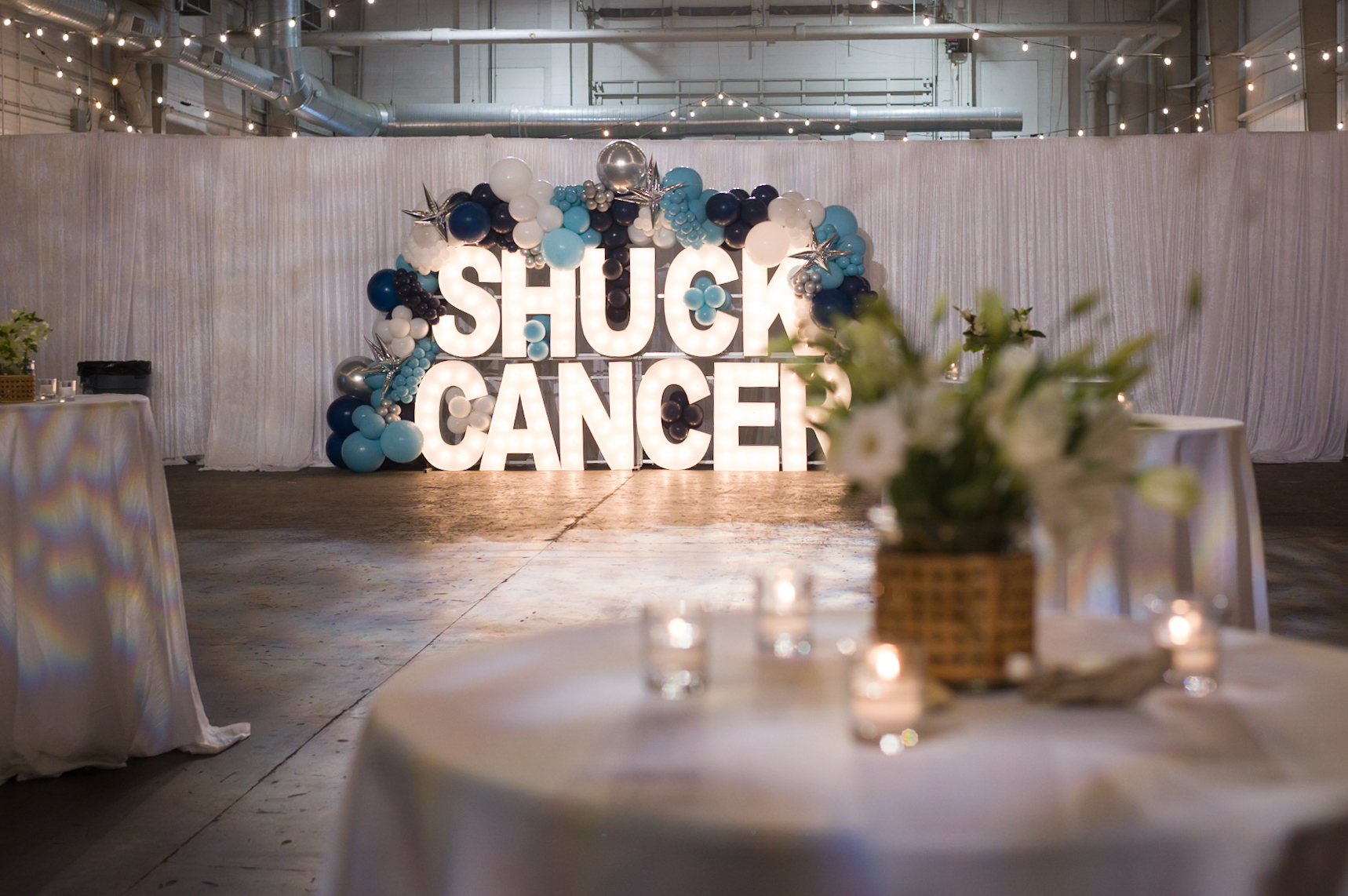 Shuck Cancer Sign with tables